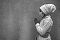 Woman at Prayer with Mask
